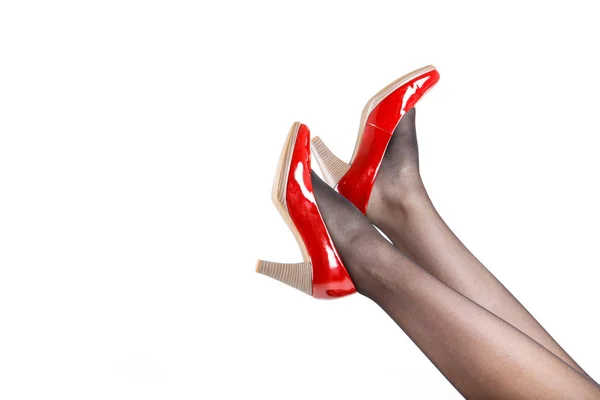 Kadının külotlu çorap giyen ve yüksek topuklu ayakkabılar bacaklar — Stok fotoğraf