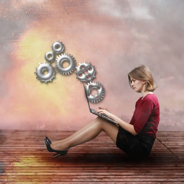 Businesswoman with gear wheel elements — Stock Photo, Image