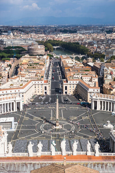 Famous Saint Peter's Square in Vatican, an aerial view of the city Rome, Italy.