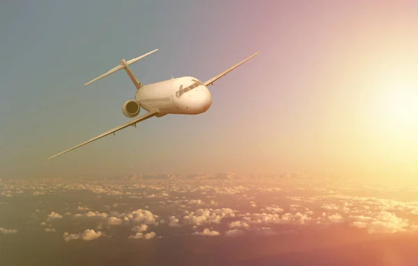 Samolot latający w chmurach — Zdjęcie stockowe
