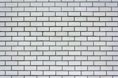 Beyaz tuğla duvarın yakın çekim dokusu. Soyut yakın plan tuğla duvar arkaplanı.