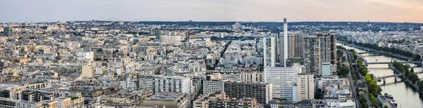 Aerial view of Paris city at sunset from Eiffel Tower. Paris, France.