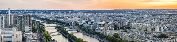 Aerial view of Paris city at sunset from Eiffel Tower. Paris, France.