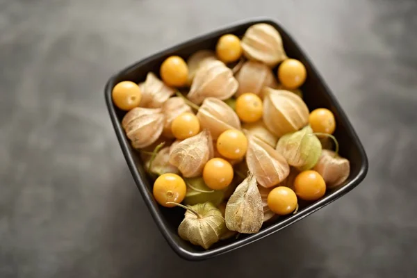 Bowl Tasty Pumpkin Dried Fruits Black Background — Foto Stock