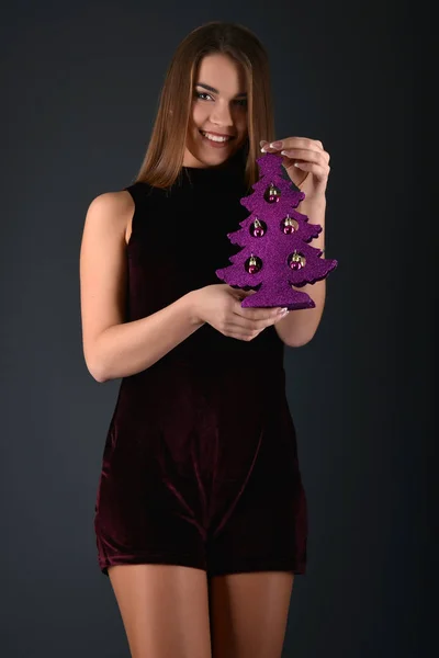 Beautiful sexy white woman in black dress posing at studio — Stock Photo, Image