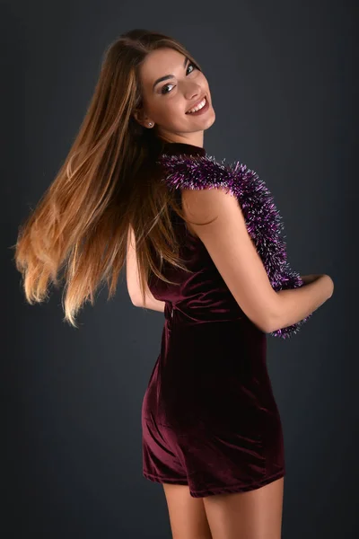 Beautiful sexy white woman in black dress posing at studio — Stock Photo, Image