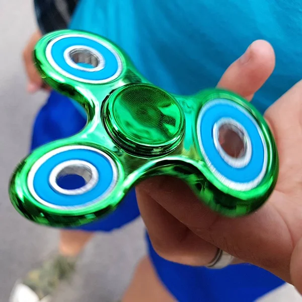 Rastlösa spinner nya — Stockfoto