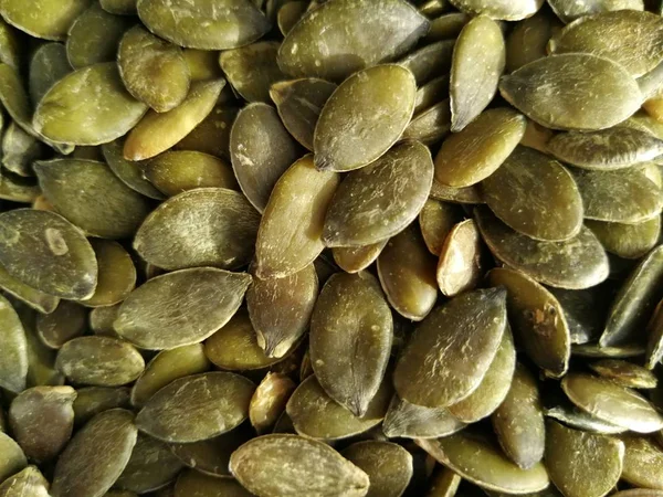 Pumpkin Seeds Pepitas Background Overhead View — Stock Photo, Image