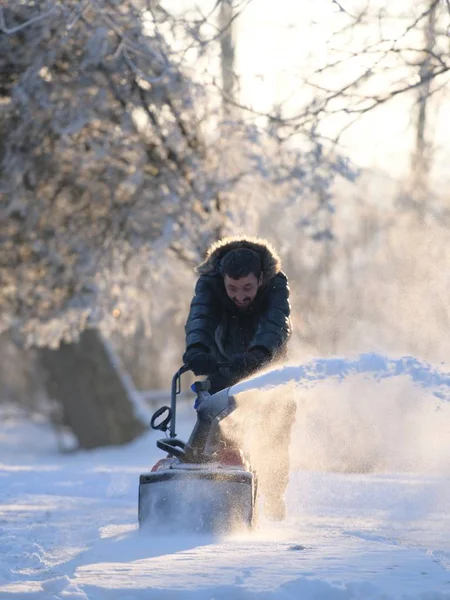 Snow removal with a snow blower