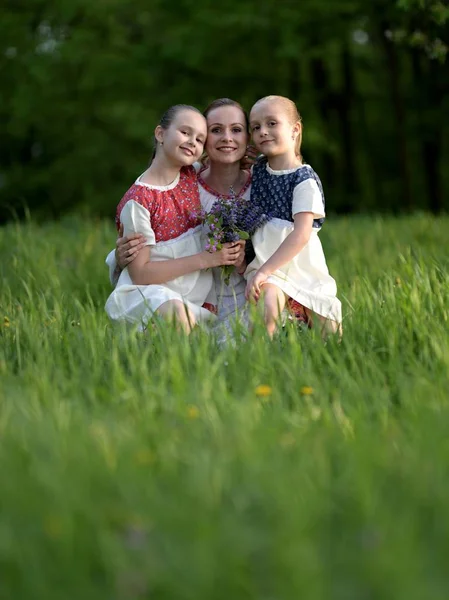 Young Family Posing Traditional Slovakian Costumes Outdoors — Fotografia de Stock