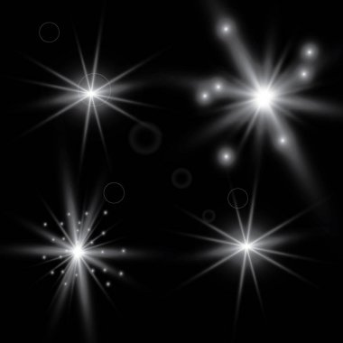 Parlayan ışıklar, flash, patlama ve yıldız etkisi. Özel efekt karanlık bir arka plan üzerinde izole.