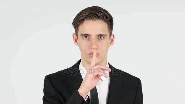 Жест мовчання підприємцем, палець на губах — стокове відео