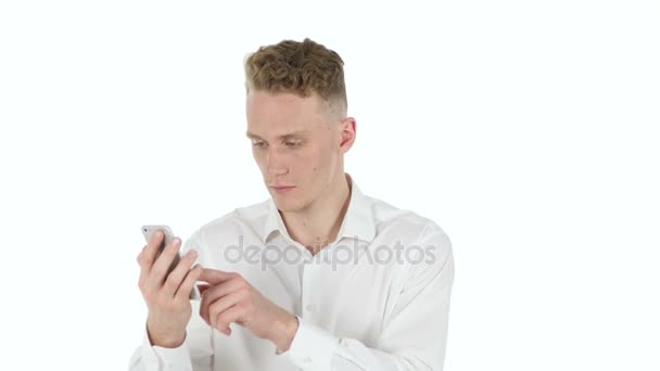 Young Businessman Browsing Online on Smartphone, White Background — Stock Video
