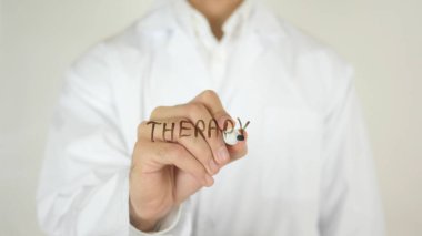 Terapi, camın üzerine yazılmış