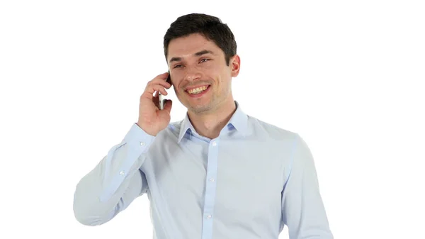 Uomo d'affari che parla sul telefono cellulare, sfondo bianco — Foto Stock