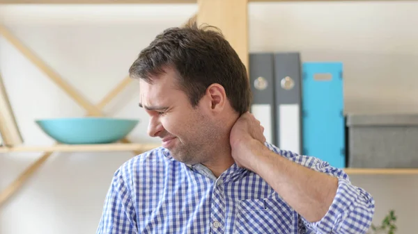 Tired Man at Work Sitting in Office