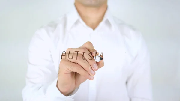 Autismo, El hombre escribiendo sobre vidrio, Escrito a mano —  Fotos de Stock