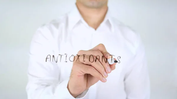 Antiossidanti, Uomo che scrive su vetro, Scritto a mano — Foto Stock