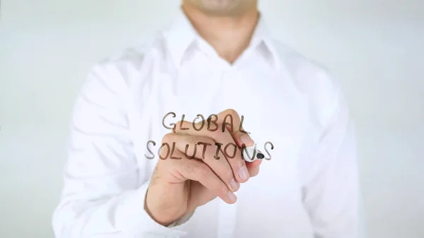 Globala lösningar, affärsman skrivande på glas — Stockfoto