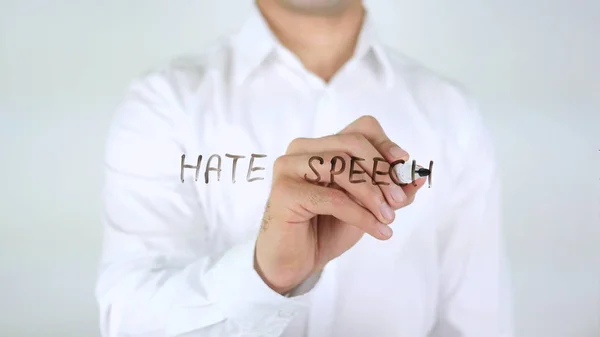 Hatpropaganda, affärsman skrivande på glas — Stockfoto