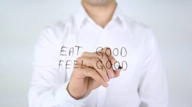 İyi hissediyorum iyi yemek, cam üzerinde yazılı adam