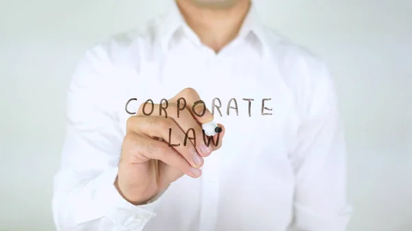 Корпоративне право, написання людини на склі — стокове фото