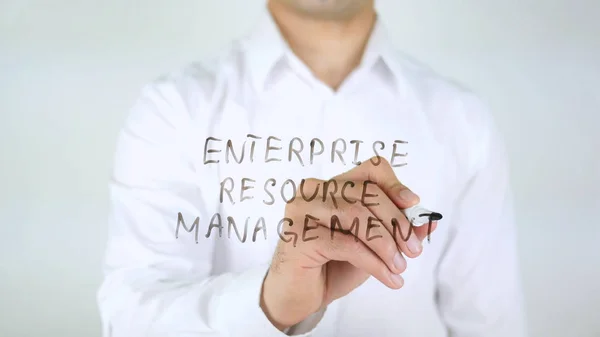 Enterprise Resource Management, Uomo che scrive su vetro — Foto Stock