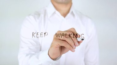 Yürümeye, dostum camın üzerine yazmaya devam et