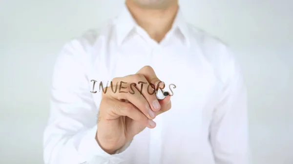 Investoři, člověče psaní na sklo — Stock fotografie