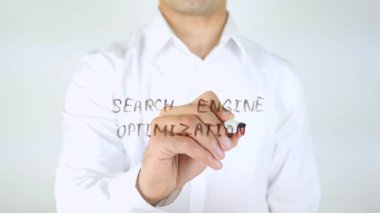 Arama motoru optimizasyonu, cam üzerinde yazılı adam