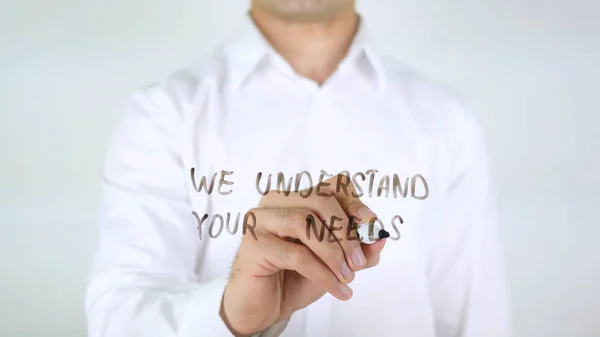 We Understand Your Needs, Man Writing on Glass