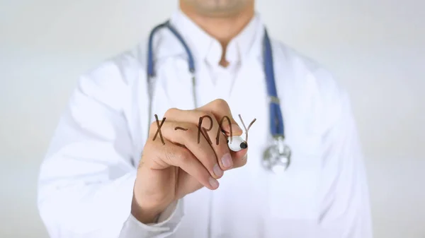 X-Ray, dokter schrijven op glas — Stockfoto