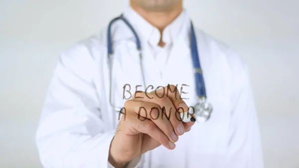 Torne-se um doador, médico escrevendo em vidro — Fotografia de Stock