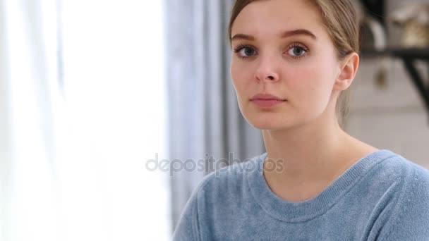 Sad Young Woman Feeling Frustrated at Home, Looking at Camera — Stock Video