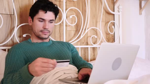 Man in Bed Excited for Successful Online Shopping, Payment — Stock Video