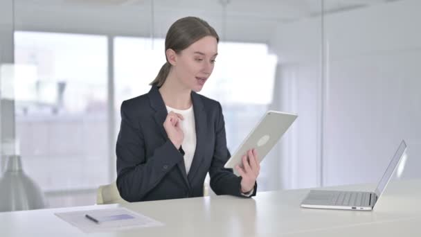 Cheerful Young Businesswoman Celebrating Success on Tablet — Stock Video