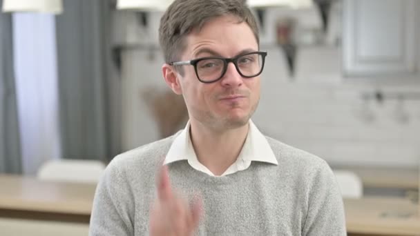 Portrait of Young Man Pointing at the Camera — Stock Video