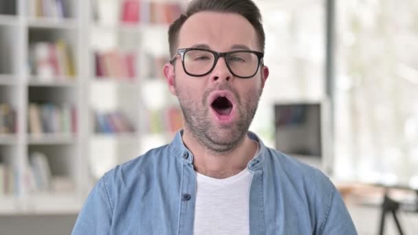 Yawning Tired Young Man in Glasses — Stock Video