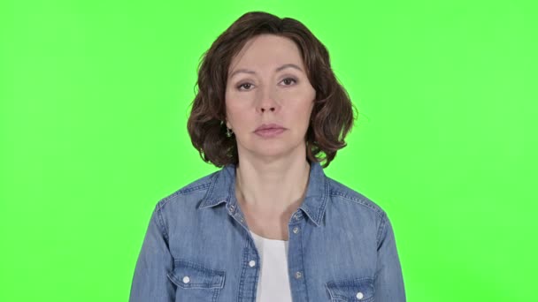 Serious Old Woman Looking at Camera, Green Chroma Key Background — Stock video