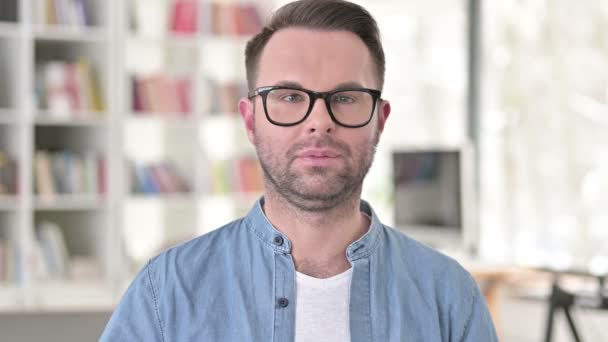 Cheerful Young Man in Glasses Smiling at Camera — Stock Video