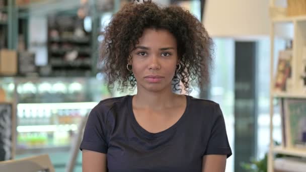 Portrait of Young African Woman with Thumbs Down Sign — Stock Video