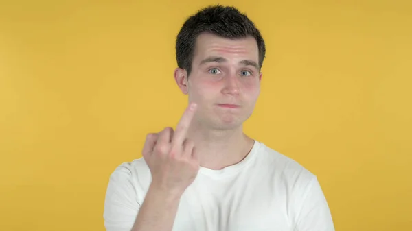 Casual Man Showing Middle Finger Isolated on Yellow Background — Stock Photo, Image