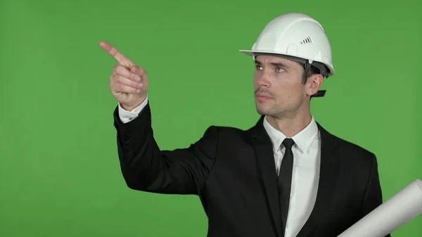 Engineer holding Blueprint and Pointing with Finger, Chroma Key — Stock Photo, Image