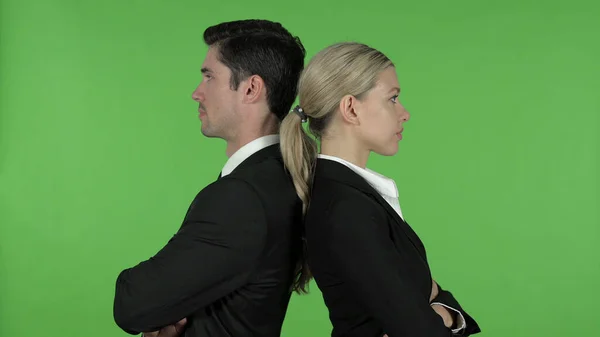 Professional Male and Female Standing with Arms Crossed and Back at Each Other, Chroma Key — Stock Photo, Image