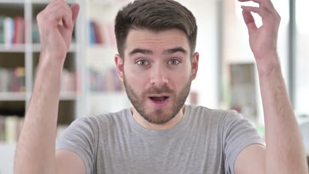 Portrait of Excited Young Man Celebrating Success — Stock Video