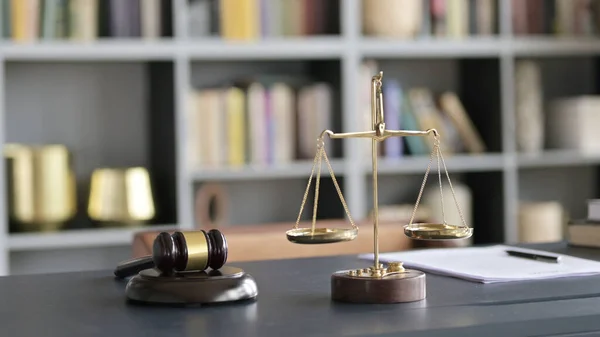 Close Up of Balance Scale and Gravel on Court Room Table