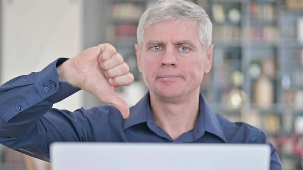 Portrait of Disappointed Middle Aged Man showing Thumbs Down — Stock Photo, Image