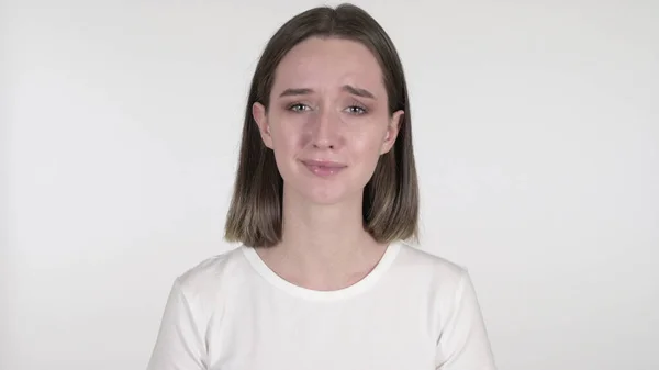 Chorando triste jovem mulher isolada no fundo branco — Fotografia de Stock