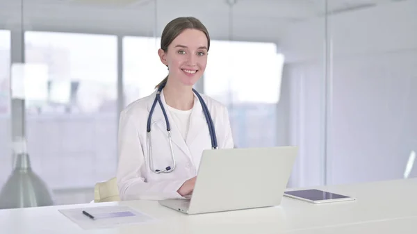Cheerful Young Female Doctor Smiling at Camera in Clinic — Stock Photo, Image
