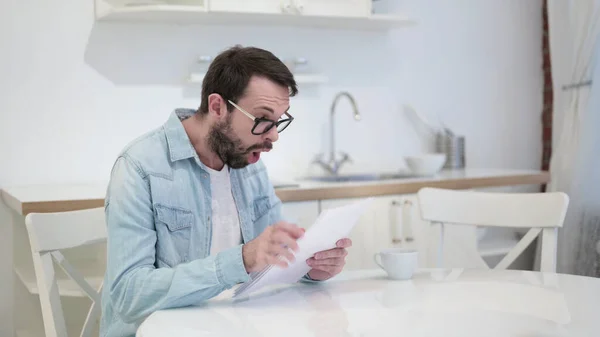 Beard Young Man in Shock after Reading on Documents — Stock Photo, Image
